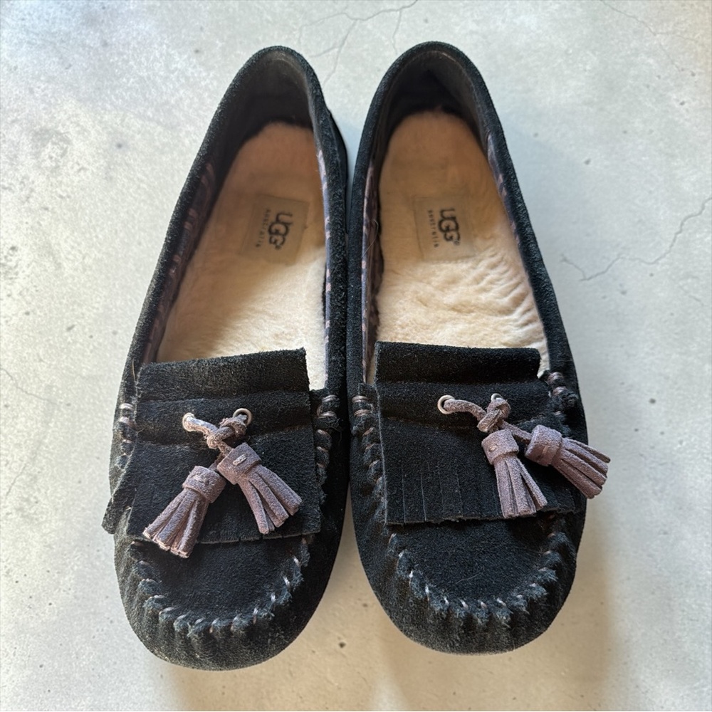 UGG Black Moccasins with Tassel Accents